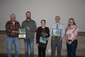 On behalf of Hoffman Construction Kyle Pedersen accepts the APWA award at the Wisconsin Chapter Awards Banquet in Stevens Point.