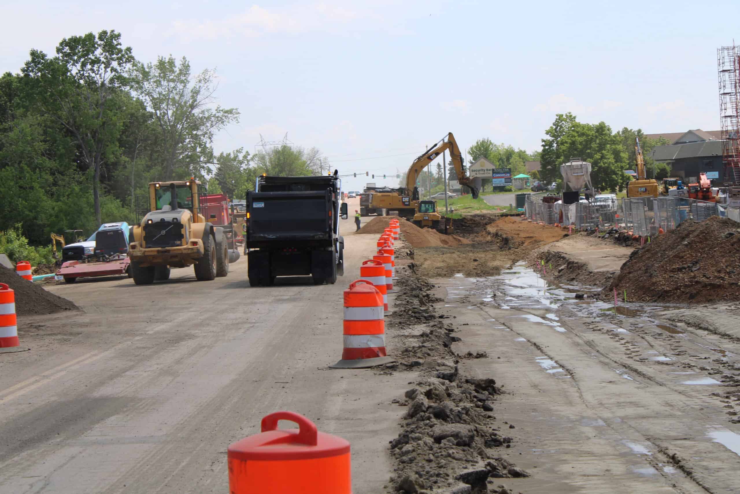 Chaska Jobsite Chaska MN Construction Road Jobsite Trucks, Dumptruck and Excavator Working