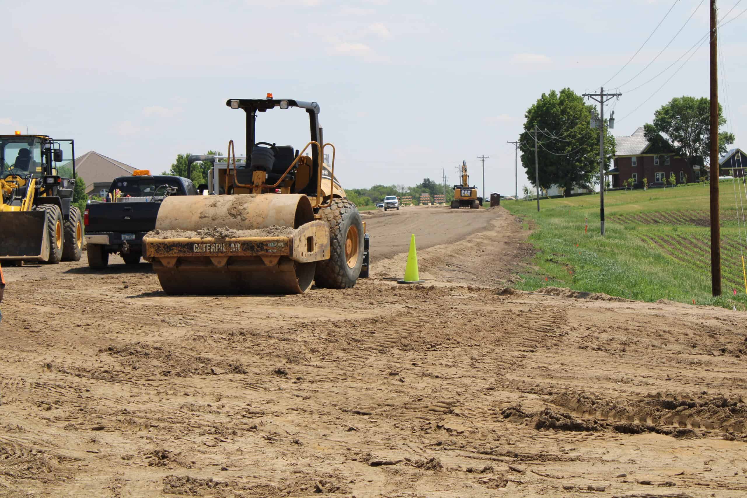 Victoria MN 3 Roller Truck Smoothing Dirt in Victoria MN Road Work