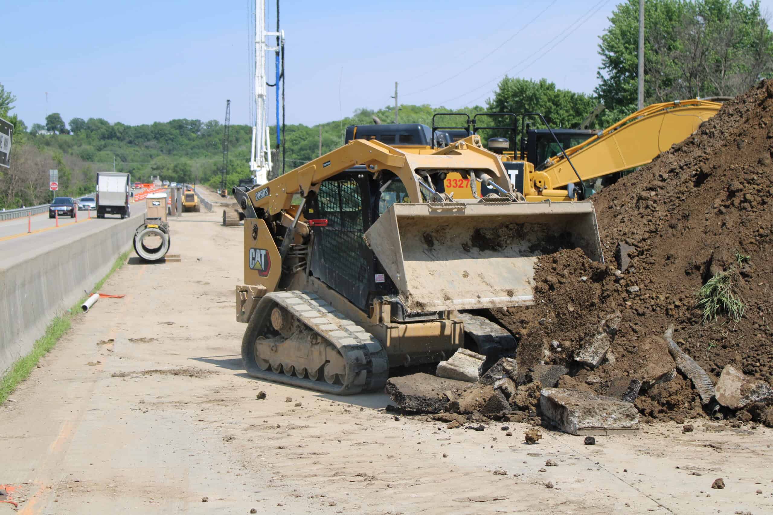 Jordan, MN 1 Truck Dumping Dirt on Jordan MN Road Construction Jobsite