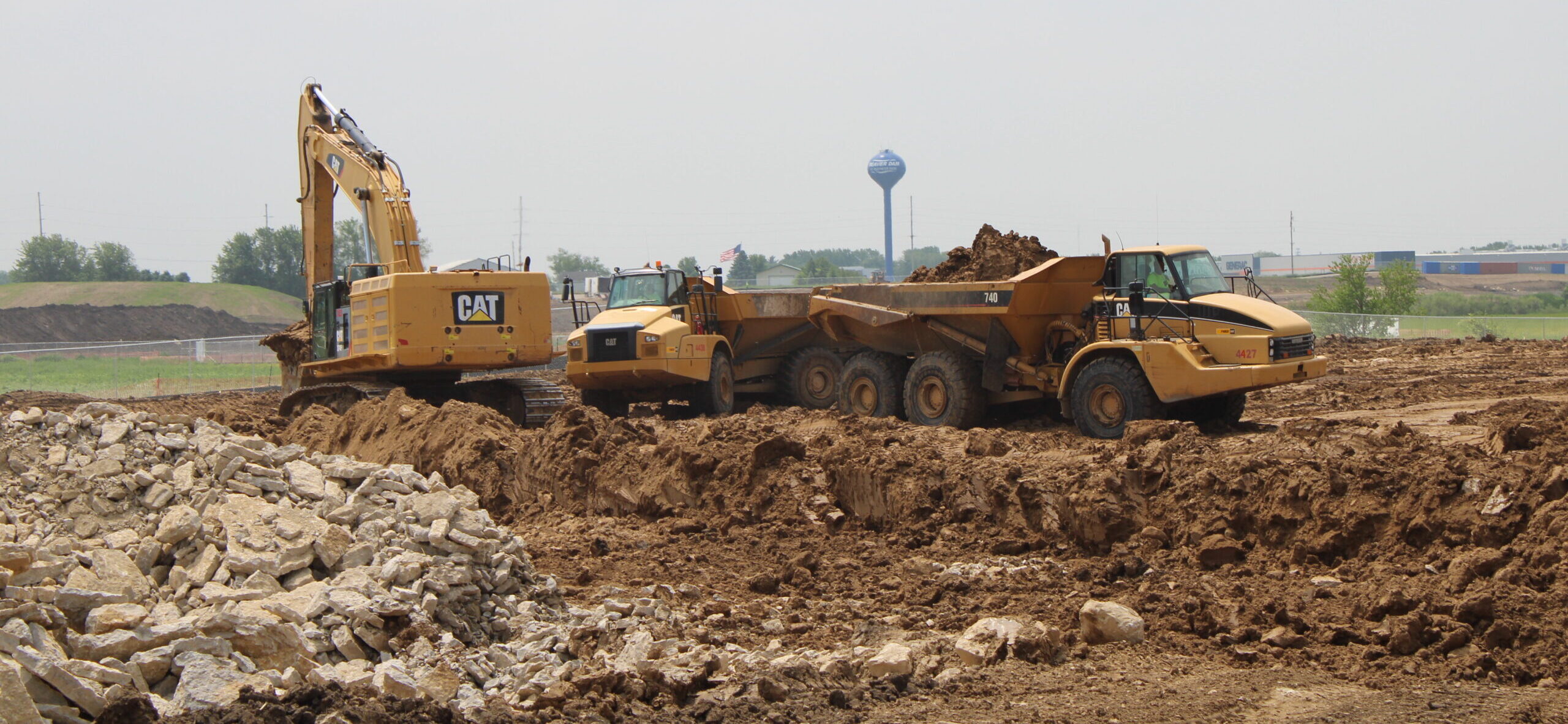 Beaver Dam, WI 2 Excavator and Dumptruck Moving Dirt in Beaver Dam