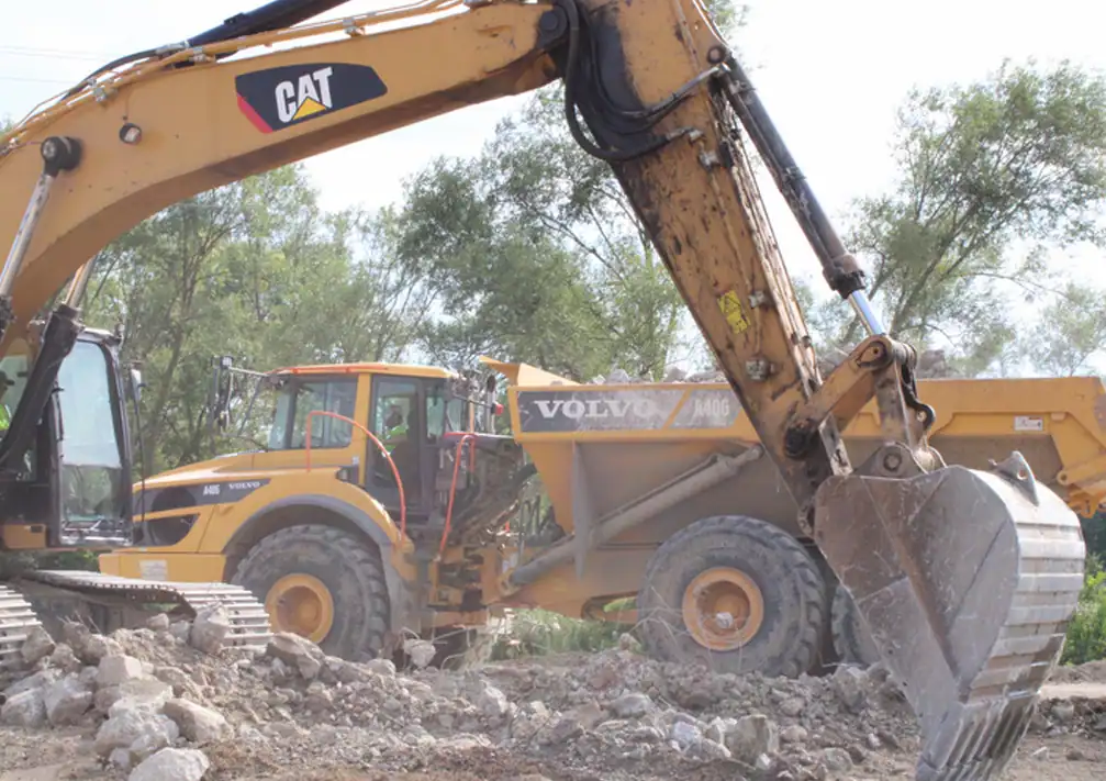 Truck Dumping Dirt on Jordan MN Road Construction Jobsite