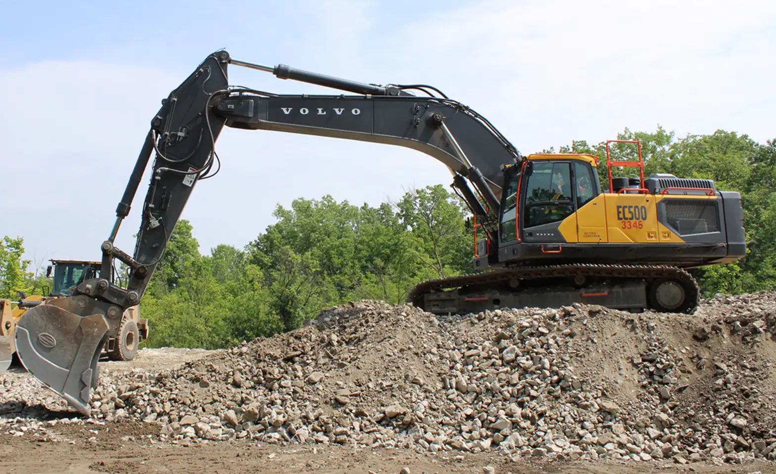 new-fleet-excavator A Volvo EC500 Excavator on a hill of gravel