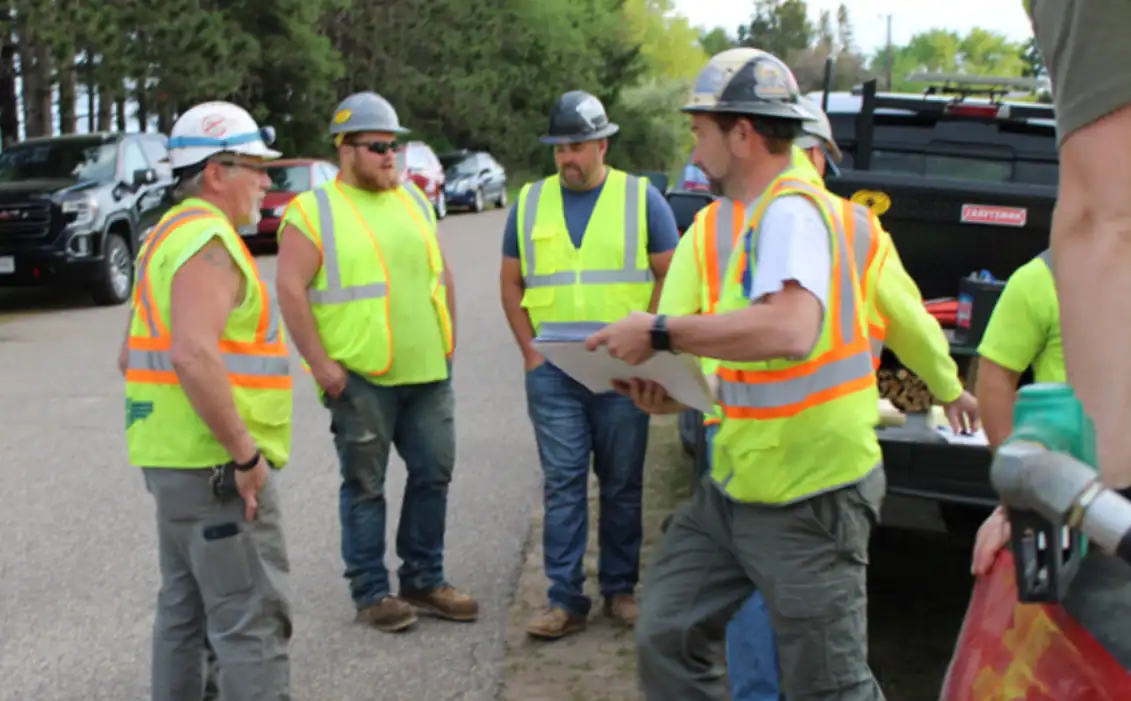 The Hoffman Team Gathers to discuss the daily agenda