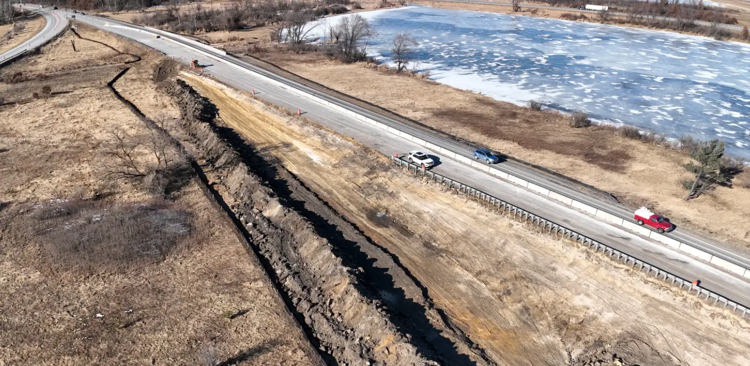 Tomah, Wisconsin construction project viewed from the air showing project site next to frozen pond